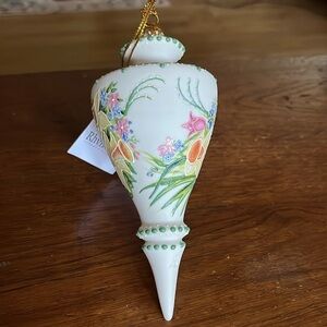 Rhyn-Rivet hand poured bisque porcelain ornament. Painted with daffodils, tulips